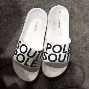 Size 12 white with black lettering south pole flip flops